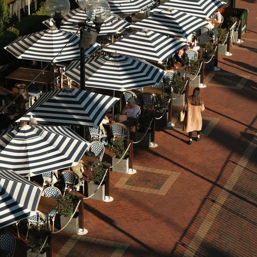 a group of people sitting at tables