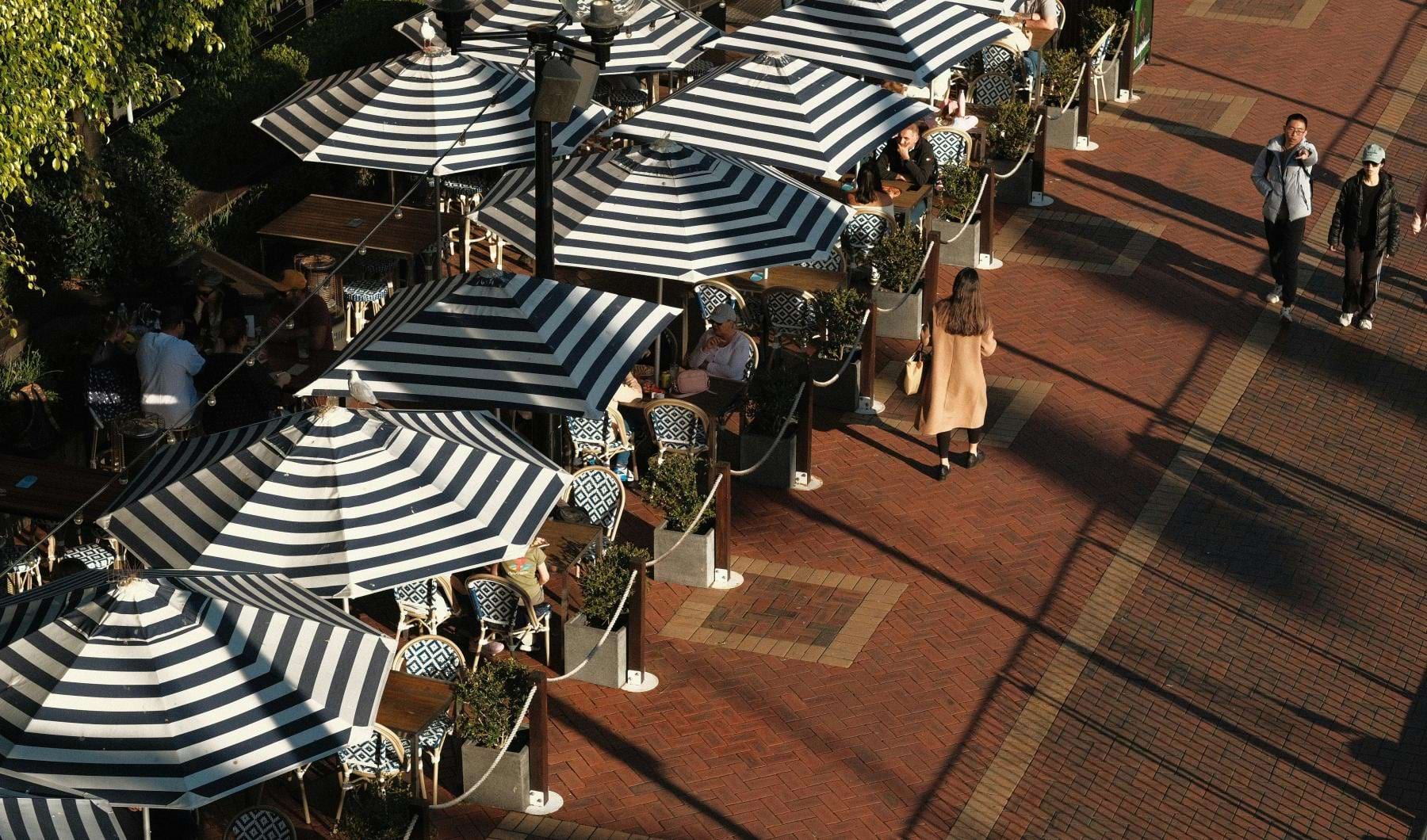 a group of people sitting at tables