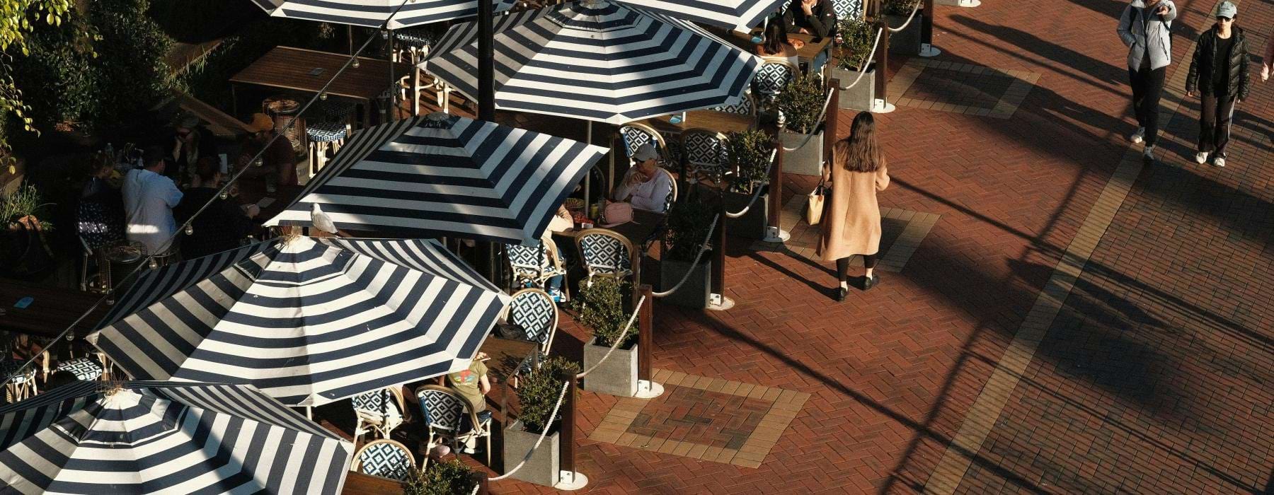 a group of people sitting at tables